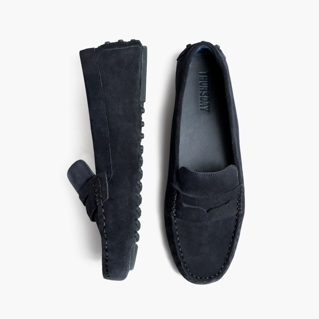 https://cdn.shopify.com/s/files/1/0419/1525/files/1024x1024-Women-DrivingLoafer-Navy-062524-Flatlay1.jpg?v=1757957602