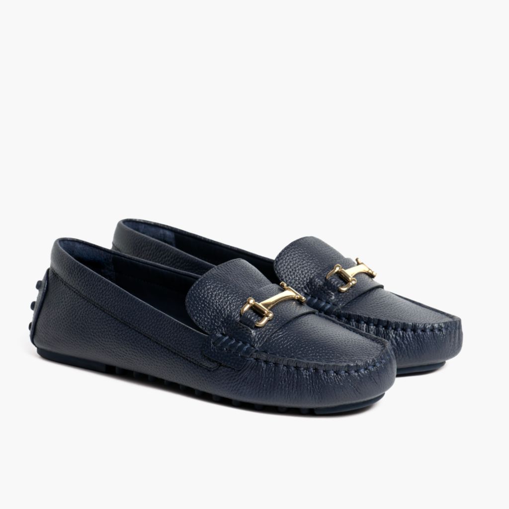 https://cdn.shopify.com/s/files/1/0419/1525/files/1024x1024-Women-DrivingLoafer-NavyGold-062524-3.4.jpg?v=1757956363
