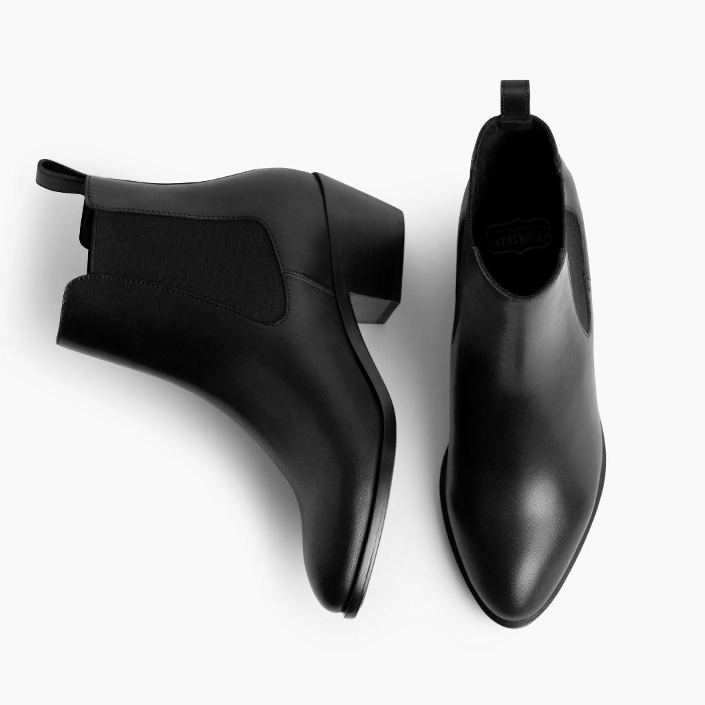 https://cdn.shopify.com/s/files/1/0419/1525/files/1024x1024-Women-DuchessBootie-BlackLeather-090623-Flatlay1.jpg?v=1694554846