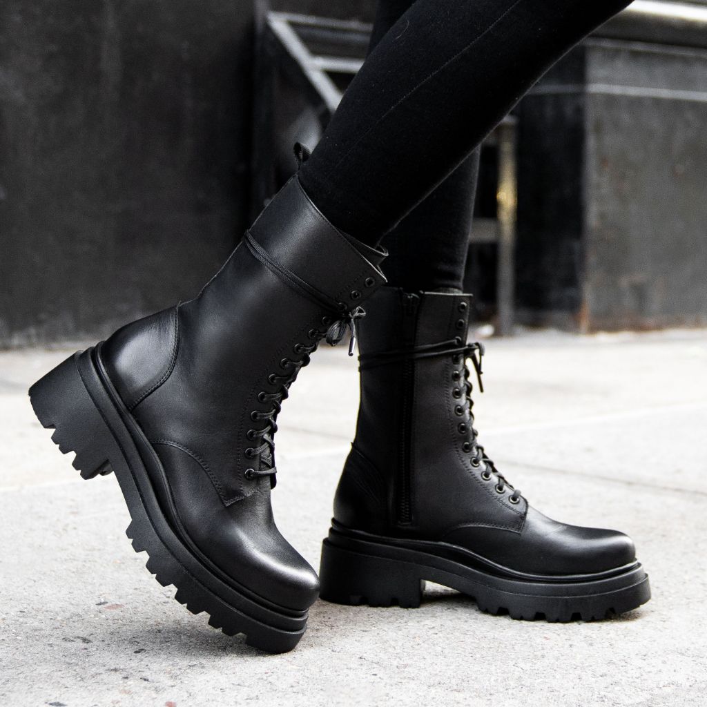 https://cdn.shopify.com/s/files/1/0419/1525/files/1024x1024-Women-Fatale-Black-100423-1.jpg?v=1696881429