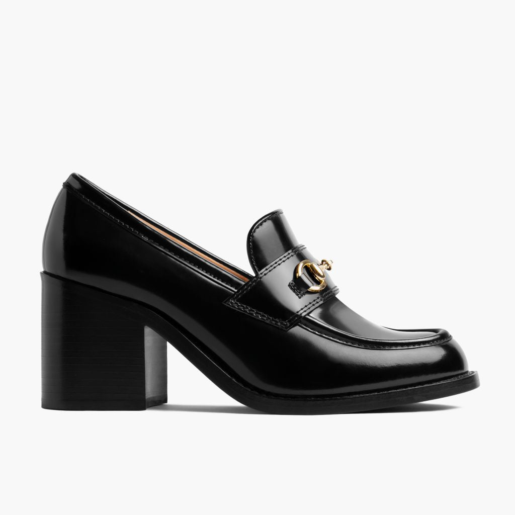 https://cdn.shopify.com/s/files/1/0419/1525/files/1024x1024-Women-HighHeelPenny-BlackxGold-012925-Side.jpg?v=1739893277