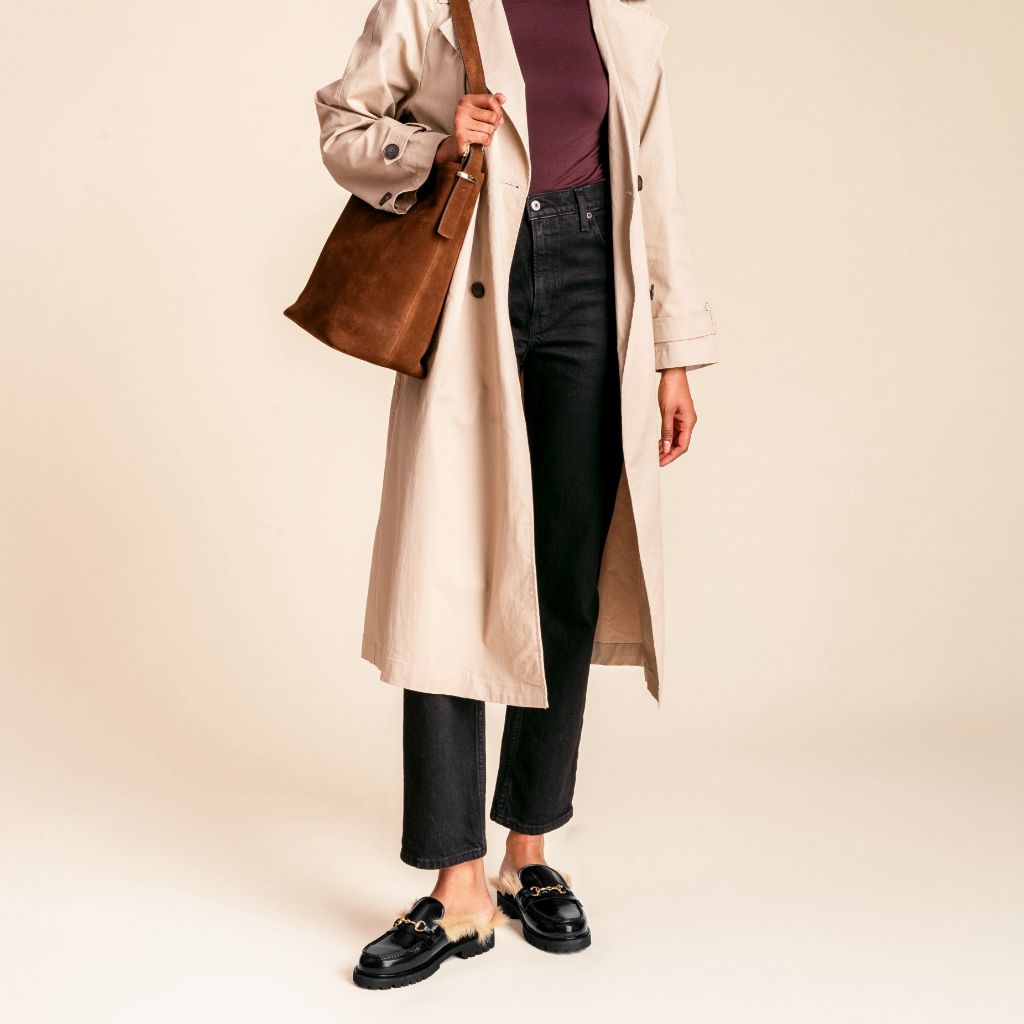 https://cdn.shopify.com/s/files/1/0419/1525/files/1024x1024-Women-PennyMule-BlackBeigeShearling-070825-3.jpg?v=1757443855