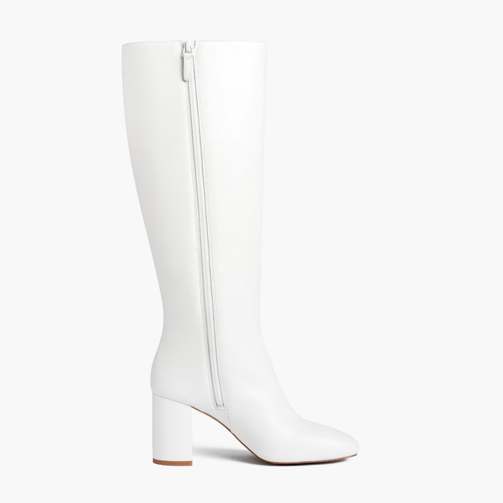 https://cdn.shopify.com/s/files/1/0419/1525/files/1024x1024-Women-Soleil-SnowWhite-033126-SideZip_5ab69650-bc84-4881-aee6-ce5743306d08.jpg?v=1779304609