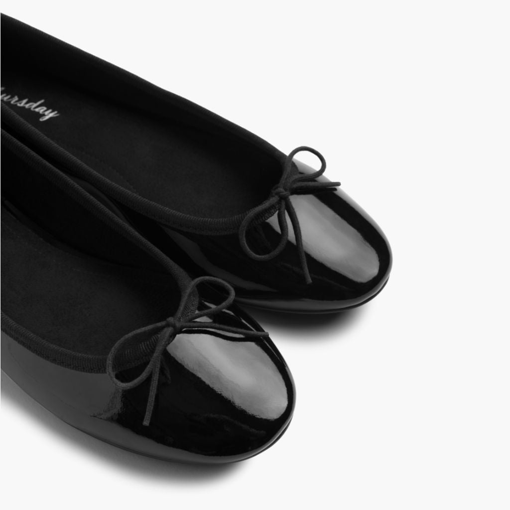 https://cdn.shopify.com/s/files/1/0419/1525/files/1024x1024-Women-TinyDancer-BlackPatent-081225-Detail.jpg?v=1756313962