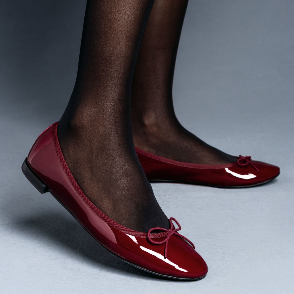 https://cdn.shopify.com/s/files/1/0419/1525/files/1024x1024-Women-TinyDancer-BurgundyPatent-020426-3_ca32a7a1-e068-48c0-8339-1d4cbe865e6d.jpg?v=1773097352