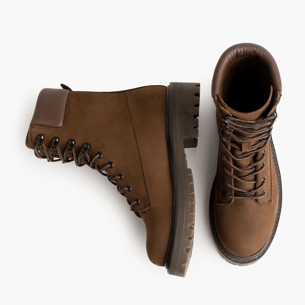 https://cdn.shopify.com/s/files/1/0419/1525/files/1024x1024-Women_s-Explorer-TanMatte-103023-Flatlay1.jpg?v=1701125826