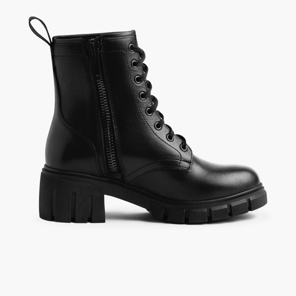 https://cdn.shopify.com/s/files/1/0419/1525/files/1024x1024-Womens-Coda-Black-101424-SideZip_311ce174-5cd5-42ed-b13f-20ea0a02dcb2.jpg?v=1729811402