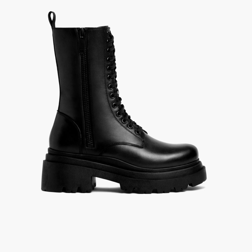 https://cdn.shopify.com/s/files/1/0419/1525/files/1024x1024-Womens-Fatale-Black-100623-SideZip.jpg?v=1696881415