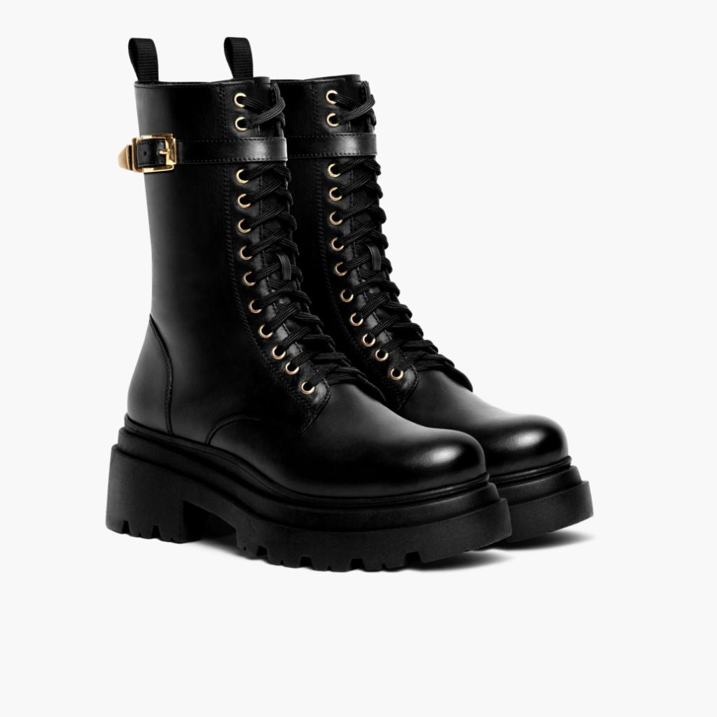 https://cdn.shopify.com/s/files/1/0419/1525/files/1024x1024-Womens-Fatale-BlackGold-100623-3.4.jpg?v=1696883244