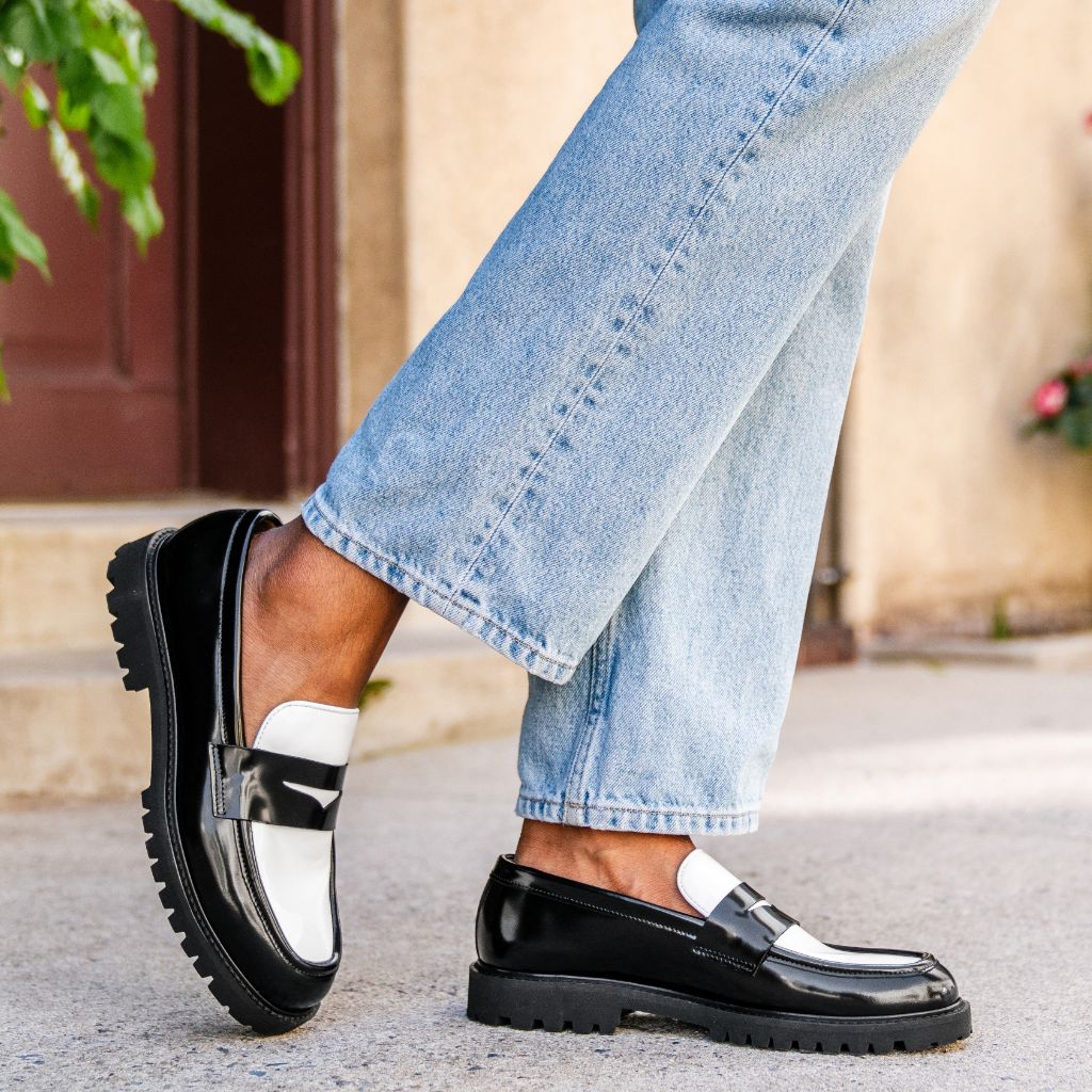 https://cdn.shopify.com/s/files/1/0419/1525/files/1024x1024-Womens-Penny-BlackWhite-052824-1.jpg?v=1718804554