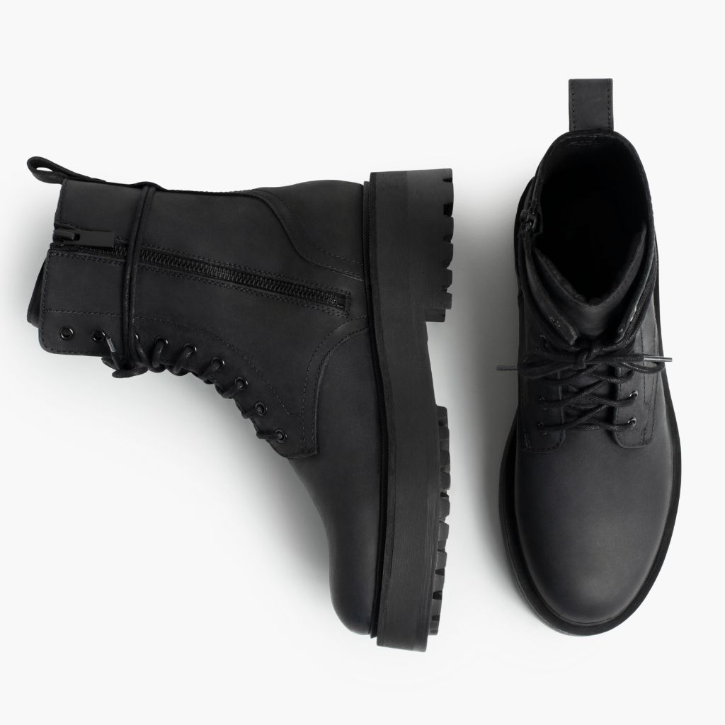 https://cdn.shopify.com/s/files/1/0419/1525/files/1024x1024-Womens-Quest-Black-082423-Flatlay.jpg?v=1693928077