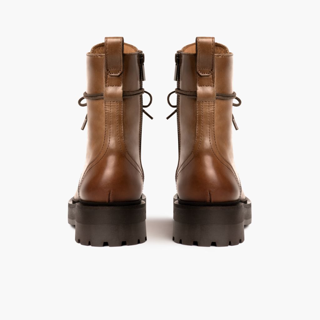 https://cdn.shopify.com/s/files/1/0419/1525/files/1024x1024-Womens-Quest-Natural-010424-Rear.jpg?v=1706555226