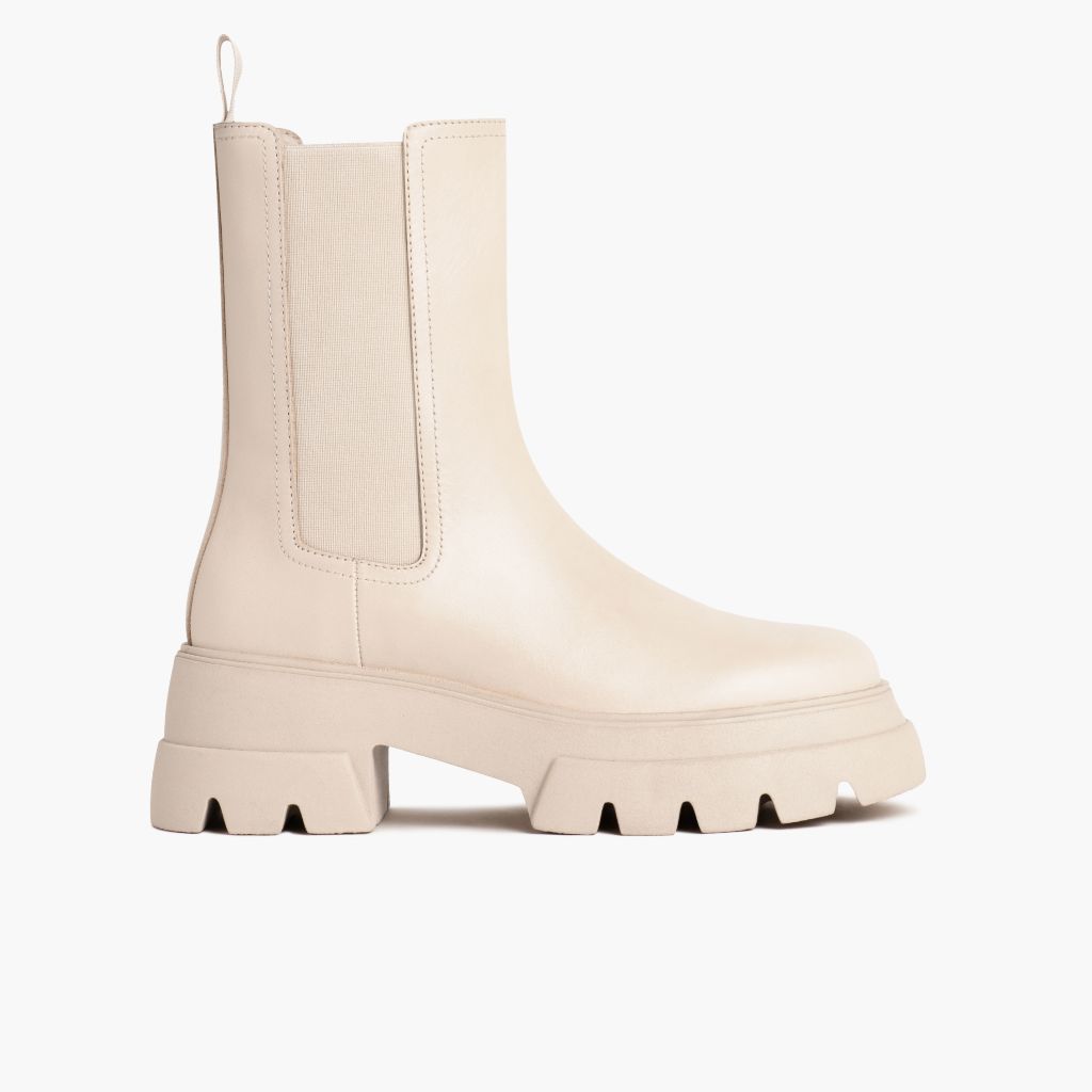 https://cdn.shopify.com/s/files/1/0419/1525/files/1024x1024-Womens-Reign-Cream-112123-Side.jpg?v=1761341847